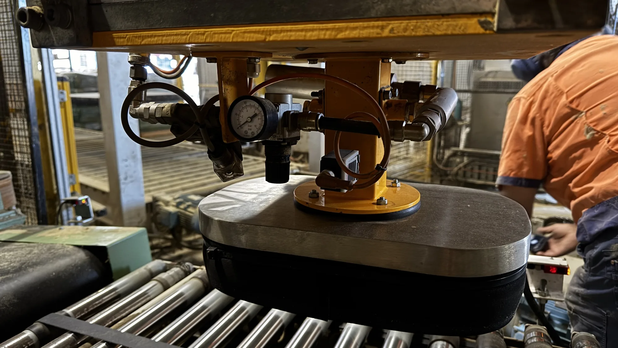 INCAS technician servicing a machine on the plant floor
