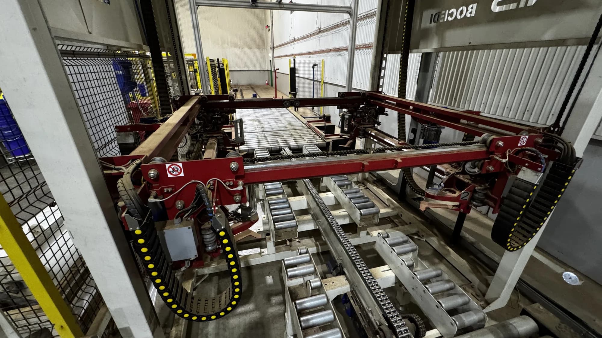 Bocedi stretch hooding conveyor on an INCAS bagging line